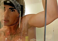 Busty tattooed female bodybuilder Dana X plays solo
