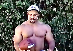 Ali Matteau Flexing and Posing (W/ A Football)