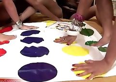 Four shemale girlfriends play kinky game of bareback twister