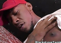 Twink gets two black rods in mouth and ass