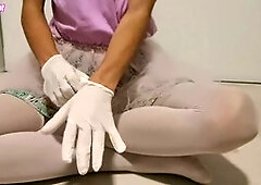 Sissy in tutu dress and latex gloves jerking off her big wood