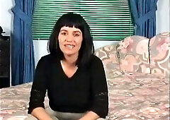 Large titted mother i'd like to fuck with hot body is filling her cunt with a sex tool on the daybed at the casting.