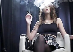 Smokin' in the studio with some nose exhales, some close up shots, some blows to camera