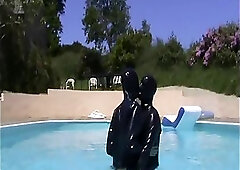 Dudes In Suits Have Fun in the Pool