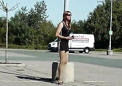 Sissyboy walk outdoors in short costume, tights and high heels