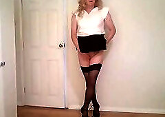 Black stockings, miniskirt and no knickers