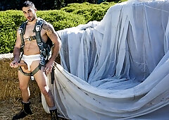 Paratrooper Samuel O'Toole stroking his massive cock here