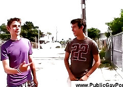 Gay plays with his cock on the streets