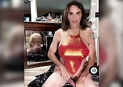 Transgender hottie tries on five different underware sets. Rear view of good butt is shown in mirror. Her good biggest melons look great in the transp