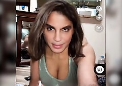 Transgender hottie tries on five different underware sets. Rear view of good butt is shown in mirror. Her good biggest melons look great in the transp