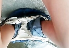 I take off my pants by the stream and play with vagina