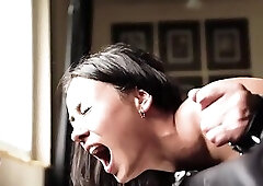 Beautiful girl in shackles brutally