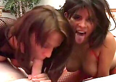 2 concupiscent marvelous Latin chick honeys with lewd bazookas suck and wank hard a large penis until cum on their beautiful faces and their throats, 