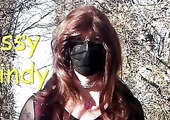 taking fotos in the park striping to show off my chastity cage and butt.