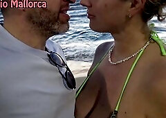 Capturing the glamorous sunset on Mallorca's shore, I was surprised by a breathtaking, curvaceous German woman who stumbled into my discharged. I