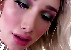 Tattooed blonde shemale with a big cock fucks a girl