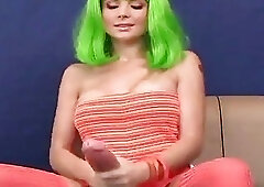 Green-haired cutie strokes her big cock and cums real hard