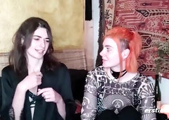 Redhead lesbian couple shares passionate kisses and strapon intimacy