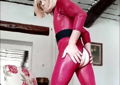 Stunning Fetish Ash-Blonde Crossdresser Crimson Pvc Catsuit.