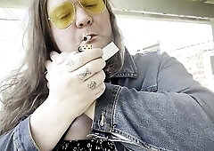 Trans beauty flashes her tits whilst smokin'