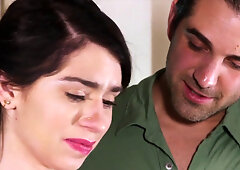 Dark-haireds bimbo with a pale body is on her knees for a BJ