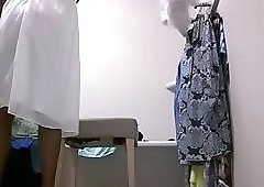 Crossdresser caught trying dress and cumming in public