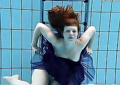 Hot chick in a public pool all alone and wet