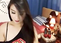 Well-Endowed transgender babe passionately pleasures herself on webcam