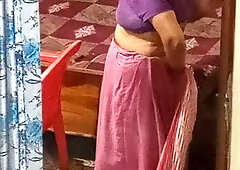 Aunty caught red handed on camera while changing dress.