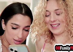 Isabella De Laa and a blonde lover share intimate kisses before taking turns on a man's cock in a steamy threesome