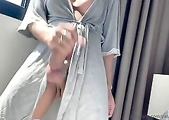 TS Yasmin Dornelles pees and strokes her massive cock to orgasm