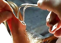 Amateur manipulates his stretchy foreskin