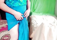 Playful trans gal pulling nylons up lazily