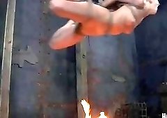 Hot new bondage slave roasted on fire the pit BDSM