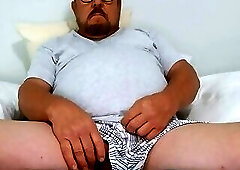 In bed taking my boxers off and jerking off.