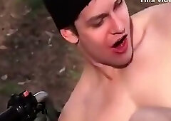 Two Muscular Guys On A Quad Bike