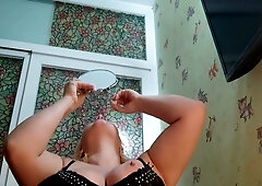 Curvy blonde in fishnets teases with an anal plug and big dildo