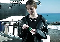 Pretty youthful Russian gal smokin' one cigarette outdoors on terrace, natural daylight, relaxed mood, soft expressions, casual lifestyle posing,