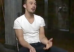 Stud in a metal cage is fucked by horny bar patrons