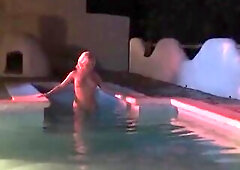 2 hot lesbo babes are swimming jointly in the swimming pool and having a worthy time.