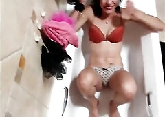 Pissing on slender doxy in her underclothing as that babe holds my jock with her feet