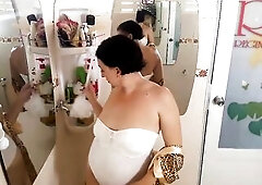 Worthy lady in the shower room trying on a leopard robe and white linen. Try on haul underclothes webcam 1-1