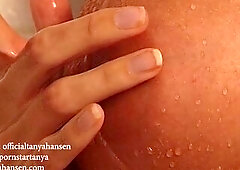This sexually excited gal plays with herself in the shower ...