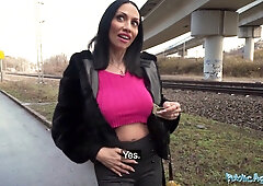 Italian agent Giulia Diamond takes a cumshot in her mouth during a forest blowjob