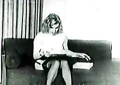 A vintage clip of Marilyn Monroe masturbating in nature's garb and reciving a sextoy as a present.