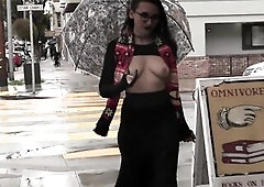 Teaser - Breasts out on a rainy day