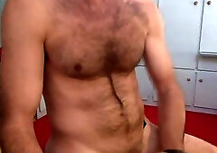 Hairy muscle guy stroking with oil (NO FACE)