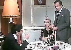 Resigned woman is spanked by a visitor whilst spouse watches.