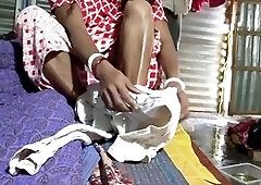 Young desi wife in a sundress explores naughty adventures with an Indian aunty