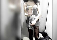 TS cum in chastity cage in dressing room